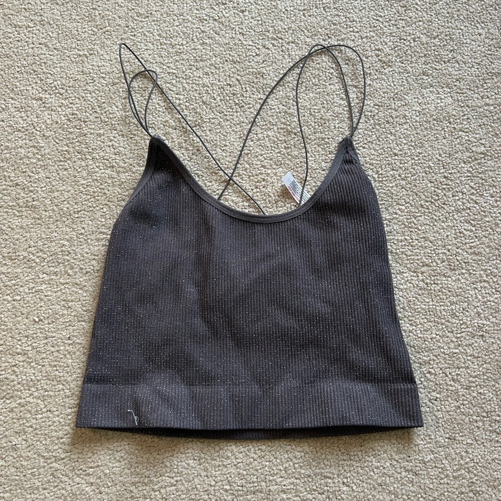 Urban Outfitters out from under tank top
